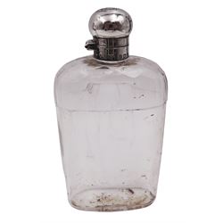 Edwardian silver mounted glass hip flask, the glass body of typical form, with rounded and cut glass shoulders, silver mounted collar and hinged domed cover with engraved monogram to top and cork to interior, and removable silver sleeve with conforming monogram to centre and gilt interior, hallmarked Mappin & Webb Ltd, Birmingham 1905, overall H16cm, silver sleeve H9.5cm, silver sleeve approximate weight 4.24 ozt (131.9 grams)