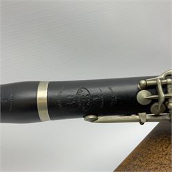 Buffet Crampon Paris African blackwood four-piece clarinet with nickel fittings, impressed 'BCPB 1937', multiple stamps for 'Macdonough & Son Sole Agent London' L67cm; in rexine covered case with two unused reeds. Biographical information: The Macdonagh family have links with the Royal Philharmonic Orchestra and are also reputedly linked with Thomas Macdonagh who was involved in the 1916 Irish uprising.