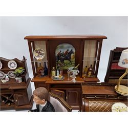 Dolls house drawing room furniture, including dressers, pink and green checked sofa and armchairs, bureau, chairs, piano, eight figures and a collection of afternoon tea miniatures