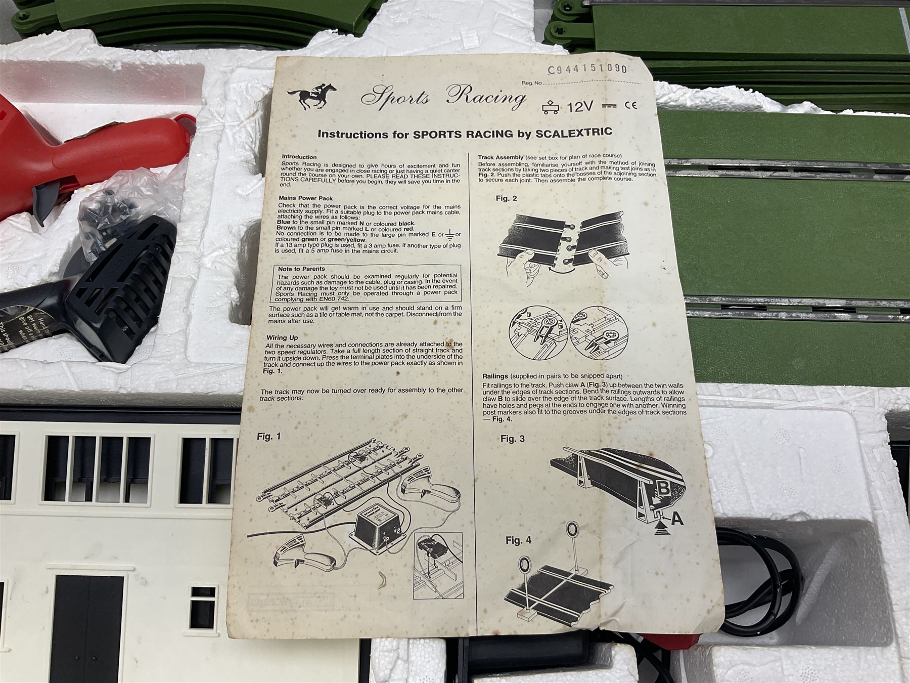 Scalextric - Newmarket racing set including track, two slot horses, two controllers, power unit/cables, accessories and instructions; boxed