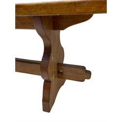 Gnomeman - adzed oak narrow bench, rectangular seat on shaped end supports united by pegged stretcher, carved with gnome signature, by Thomas Whittaker, Little Beck 