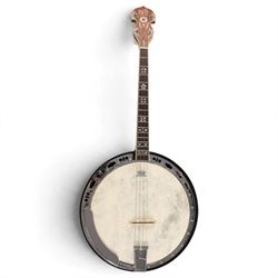 Barnes & Mullins Troubadour four string banjo, with Remo head and mother of pearl inlay to...