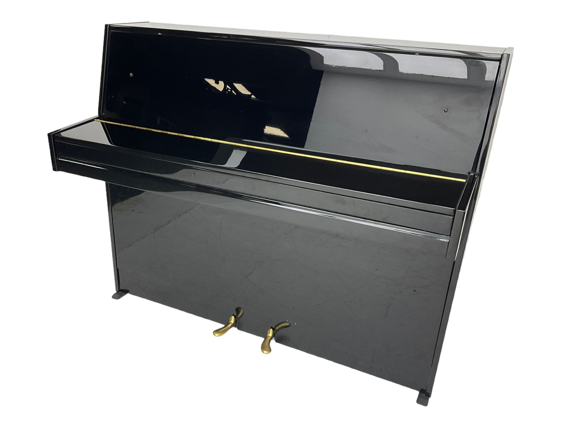 Steinmayer - contemporary upright piano in a black lacquered case, iron over strung frame with an underdamper action, internally operated hammer mute, sustain and Una-corda pedals, with a  6 octave 73 key compass, serial number '551051128'. L122cm