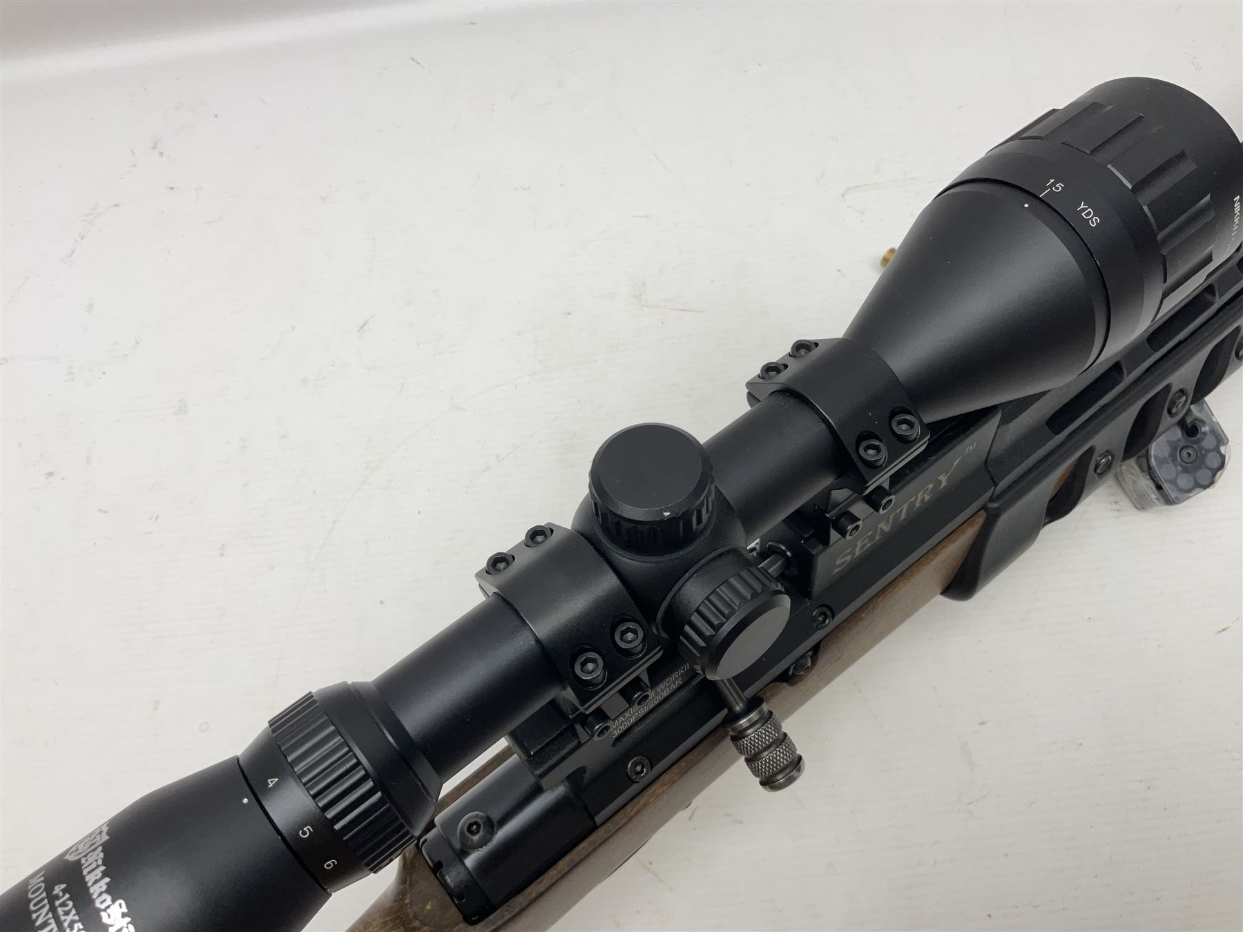 Lee Enfield Sentry Model 705 .22 cal. PCP rifle, with Nikko Stirling Mountmaster 4-12 x 50 scope and wooden stock with pistol grip; serial  no.112117897, L104.5cm overall; in soft carrying case  NB: AGE RESTRICTIONS APPLY TO THE PURCHASE OF AIR WEAPONS.