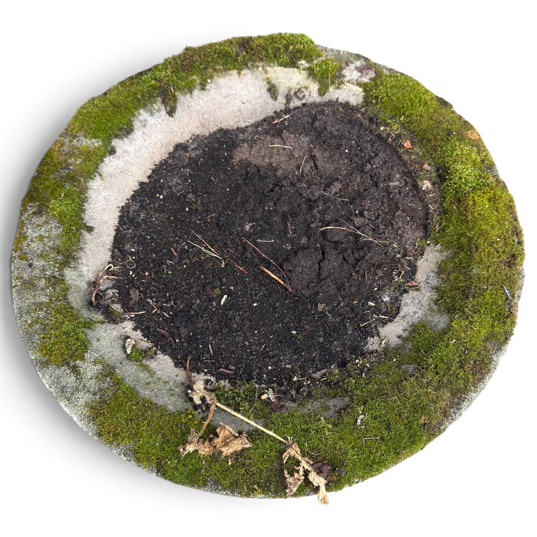 Weathered cast stone birdbath, circular bowl over a lobed baluster pedestal on circular base; weathered cast stone sundial of squared form with re-entrant corners and removable metal sundial with personified death motif