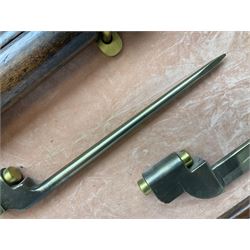 WW2 Lee Enfield No.4 Mk.1 .303 bolt-action rifle with hinged butt compartment, made by SA Ltd., Long Branch, Canada 1942, serial no.5L0646 L113cm; mounted on a framed display board with No.4 Mk.II spike bayonet, No.9 Mk.1 blade bayonet, two inert 5-round clips and brass biographical plaque by Antler Military Originals detailing DA Cert No.C3444 OLD STYLE DEACTIVATION SO FIREARMS CERTIFICATE REQUIRED OR RFD