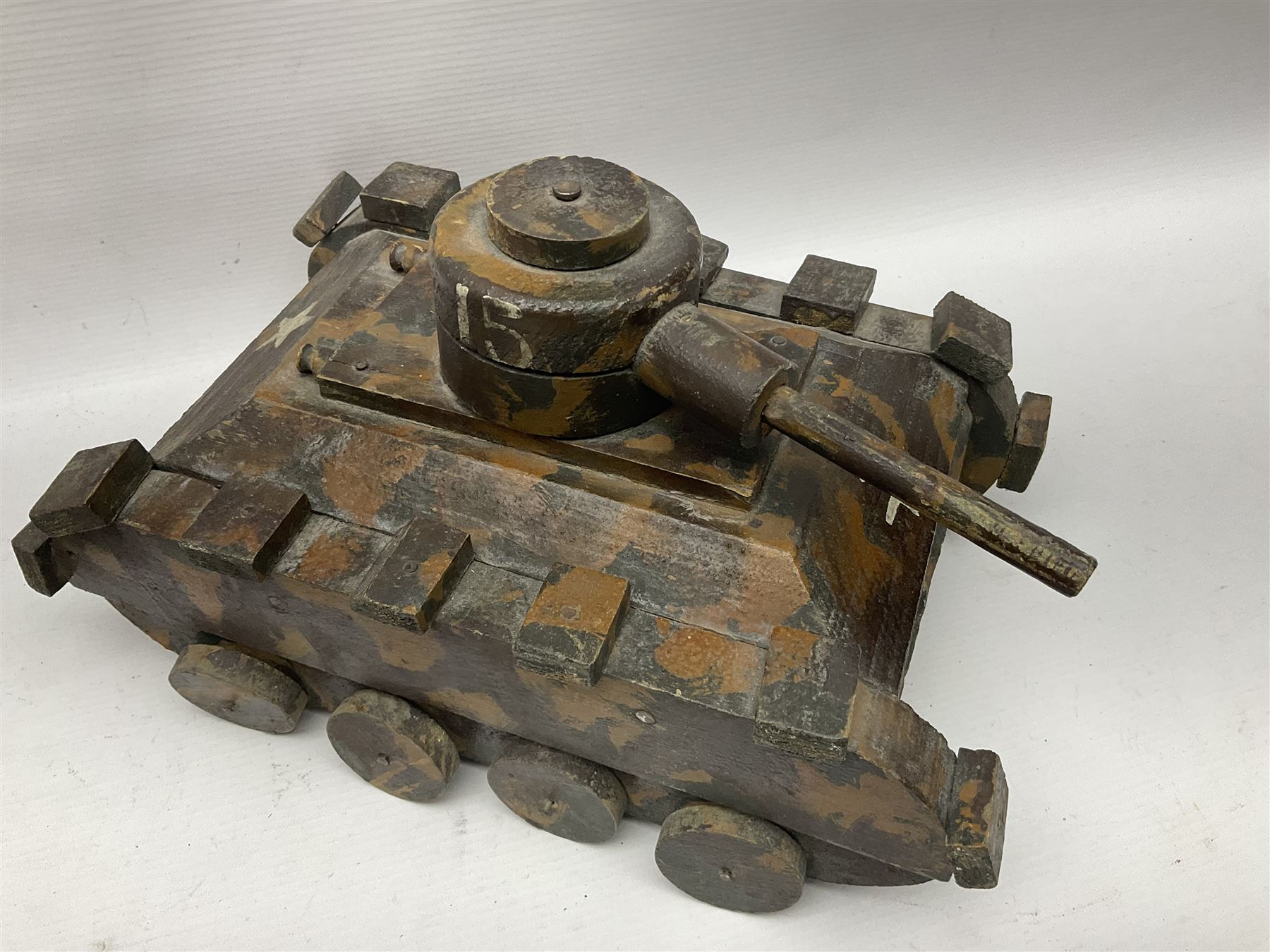 1940s French wooden eight wheel model FFI free tank, painted in brown camouflage, together with a 1940s wooden scratch built model of a landing craft, tank H18cm, W31cm
