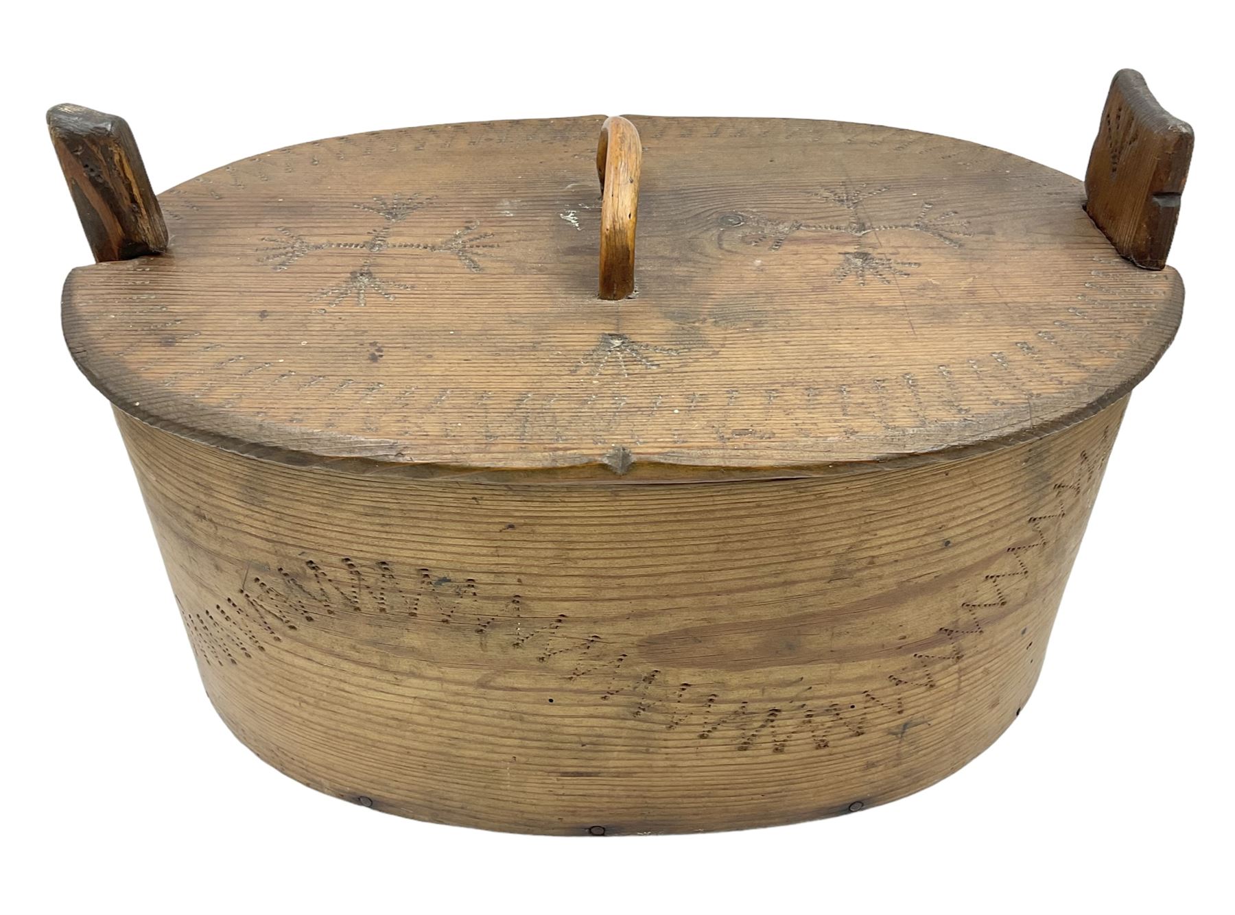 19th century Scandinavian Svepask / Tine box, the pine oval form body with notched posts and conforming lid decorated with Folk Art style pokerwork decoration and single carry handle, L38cm