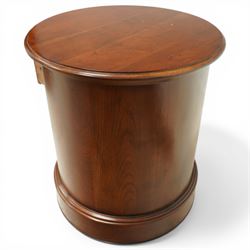 Willis & Gambier - circular chest, three drawers with brass pulls on a moulded 
