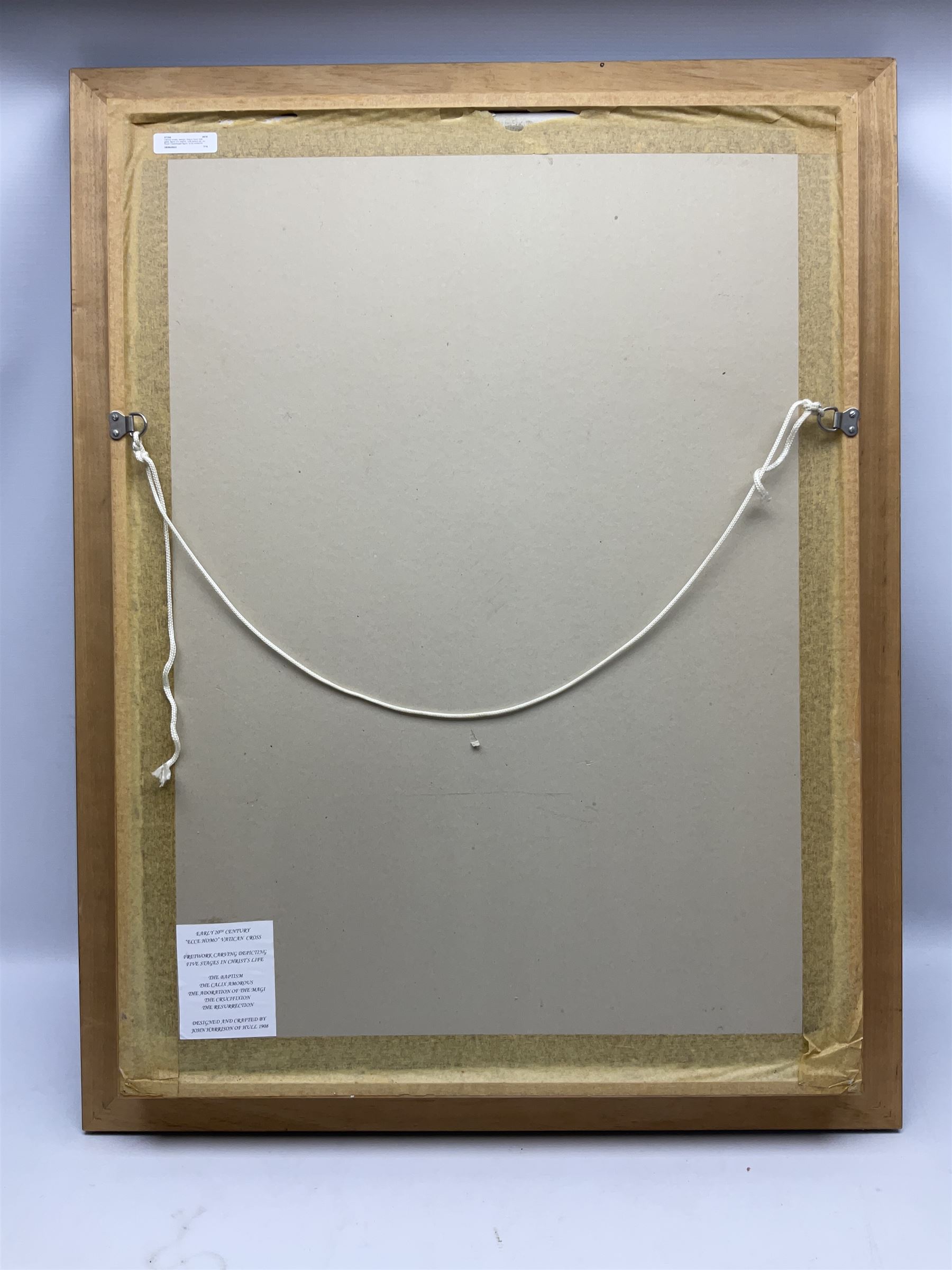 Cork carving of a religious cross depicting intricate scenes of various religious figures and motifs amongst trees and foliage, with central circular panel of Jesus Christ, in glazed frame, H95cm