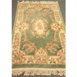  Chinese pale green ground washed wollen hearth rug, 184cm x 122cm  