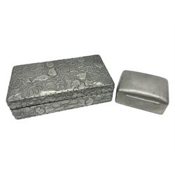 Liberty & Co Tudric pewter cigarette box, of plain rectangular form, with planished decoration to the slightly domed cover, opening to reveal a softwood interior, stamped Made in England 01234 Tudric Solkets beneath, together with another cigarette box, with applied pewter panels repousse decorated throughout with flower heads and leaves, with compartmentalised softwood interior, largest H5.5cm, W23cm