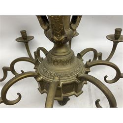 20th century heavy brass eight branch electrolier, detailed with putti masks, approximately H60cm W71cm