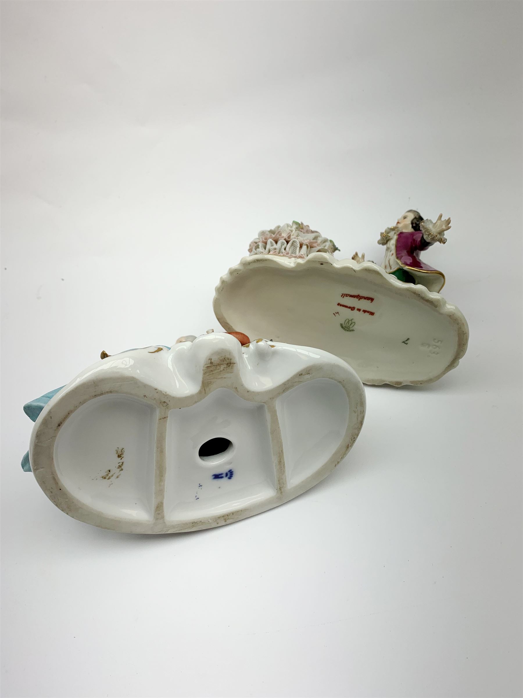 A group of various Continental figures, to include examples marked Dresden and Capodimonte, plus others with spurious blue cross marks beneath. (14). 