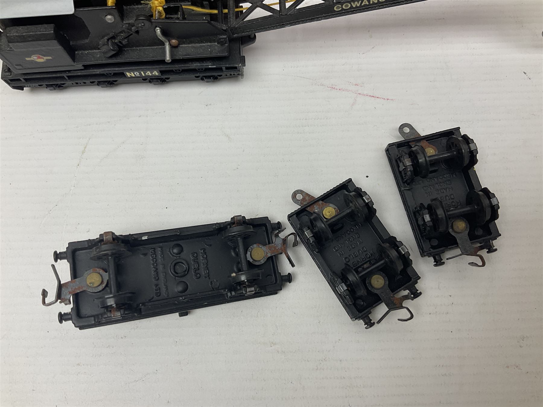 Hornby Dublo - 4620 Breakdown Crane No.133 in red with Match Trucks; boxed; another unboxed 4620 Breakdown Crane No.144 in black 'Cowans Sheldon' with Match Trucks; and nine Trackmaster goods wagons comprising three GW Open Wagons, two GW box vans, three NE Open Wagons and one NE Box Van; all boxed (11)