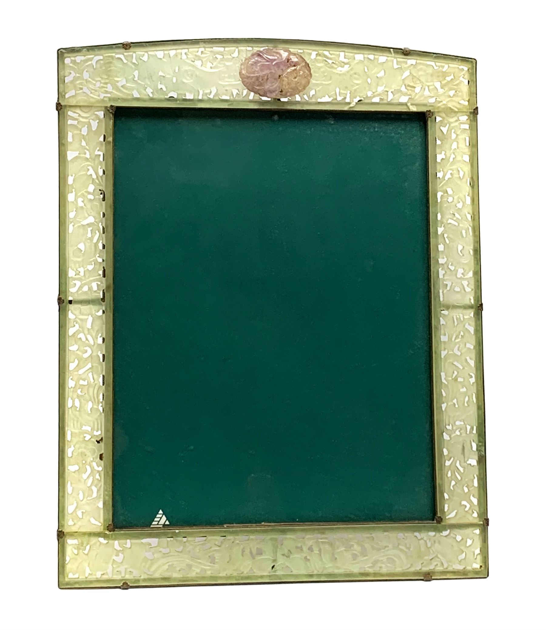 Early 20th century Chinese jade mounted photograph frame, of rectangular form the pierced jade frame carved with flowers and birds, the top panel carved with Foo dogs flaking an applied carved lavender coloured boss, with easel support verso, H33cm
