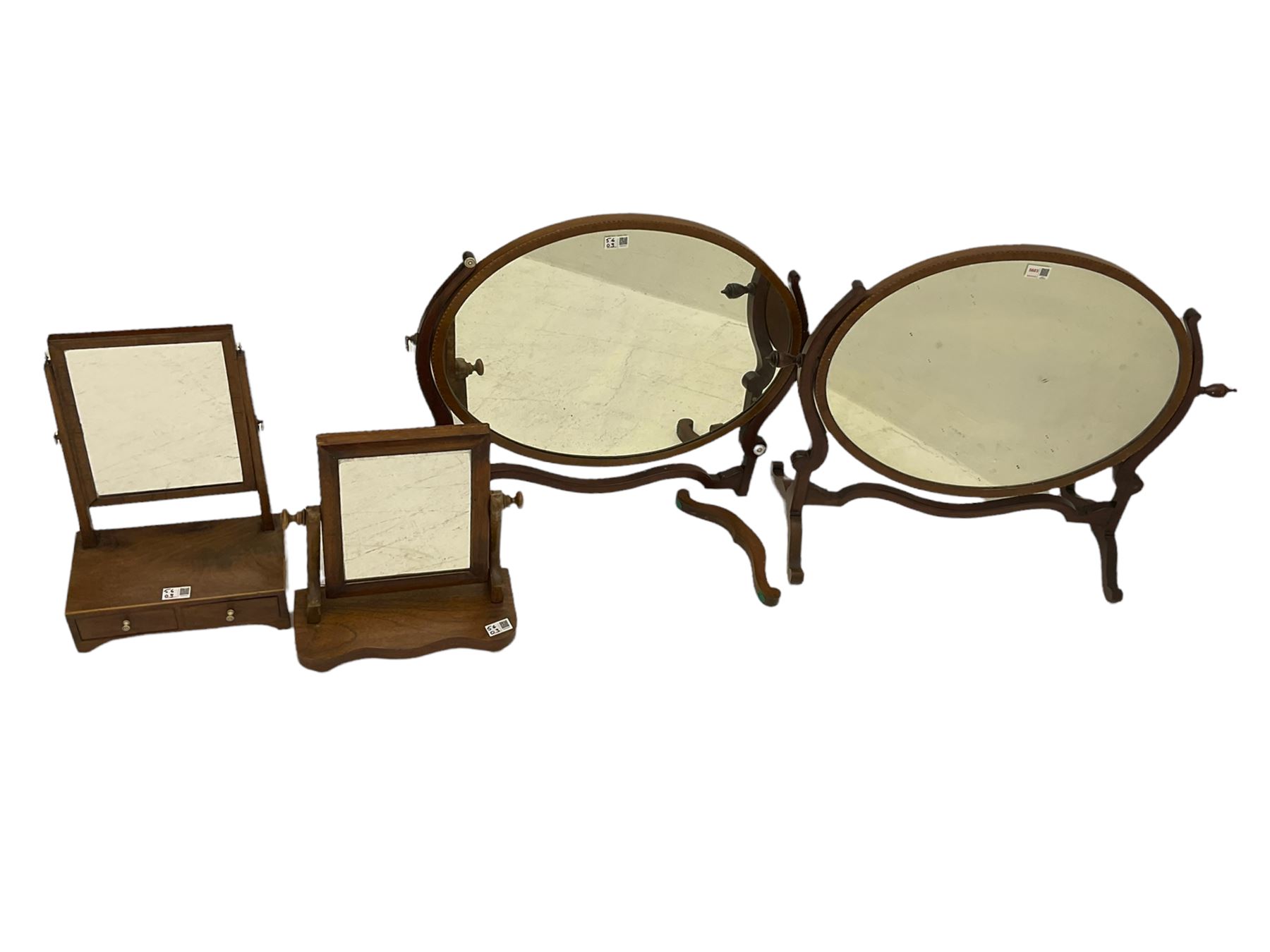 Early 20th century oval mahogany dressing table mirror (W82cm), a similar dressing table mirror, and two small 19th century swing mirrors (4)