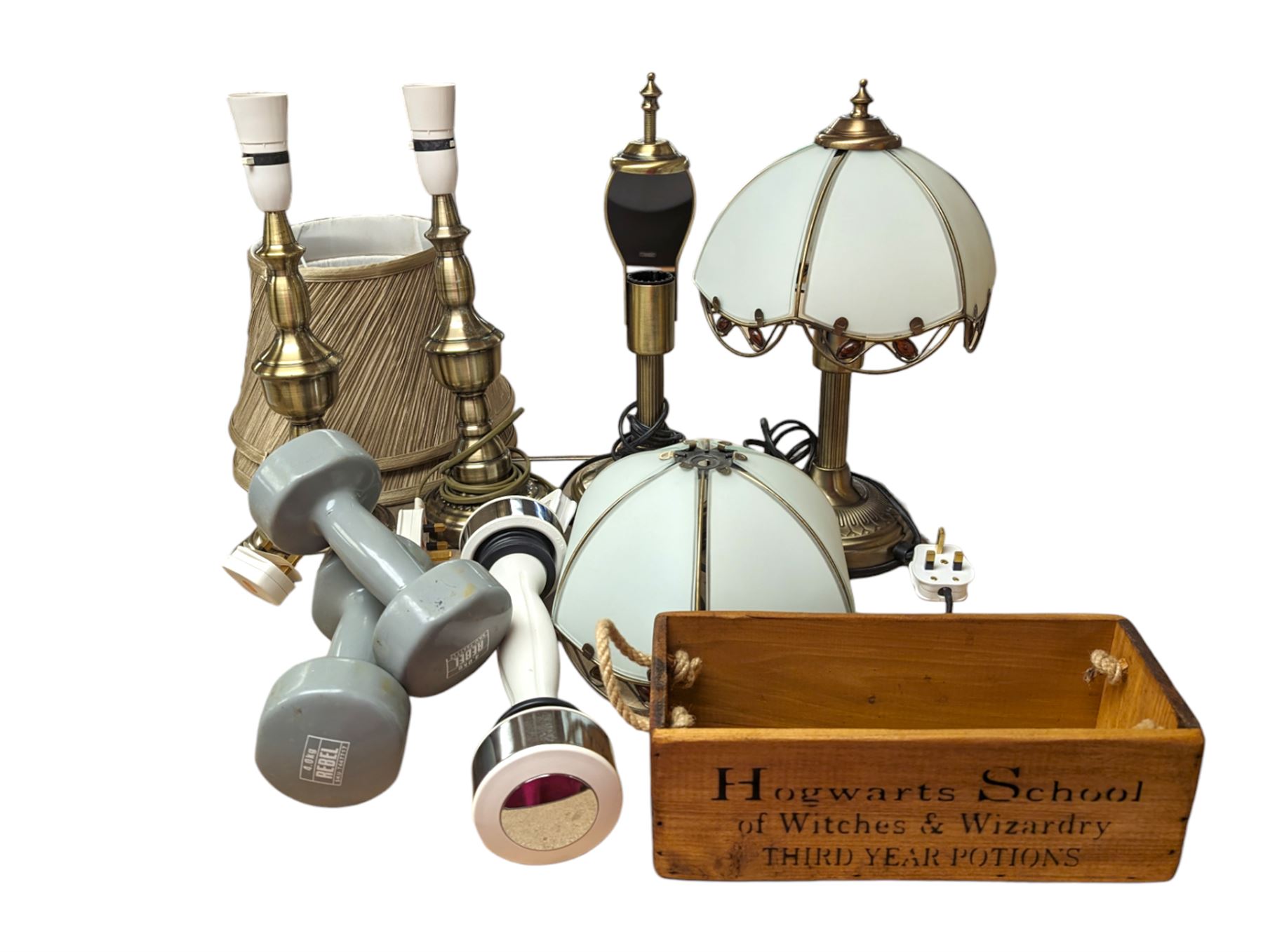 Two pairs of table lamp bases, with two glass shades and two fabric shades, together with a wooden 'Hogwarts' box and dumbbells