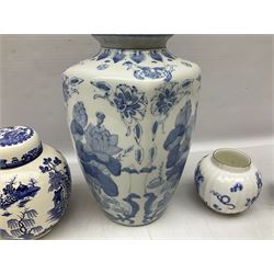 Chinese blue and white vase of baluster form decorated with lotus flowers, together with pair of Japanese vases with blossoming branches, Mason's blue and white lidded ginger jar, Royal Worcester Blue Dragon, all with marks beneath, largest H31cm (4)