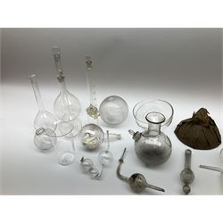 Collection of 19th century and later pharmaceutical laboratory glass, to include, volumetric flasks of various sizes, conical flask, stratus flask, etc (25) Provenance: discovered in the storeroom of a long established Hull pharmacist and opticians