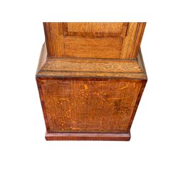 An oak and mahogany longcase clock by William Hewson, Lincoln c 1860, with a swans neck pediment, ball and spire finials and brass paterae, break arch hood door flanked by reeded pilasters with brass capitals, oak trunk with canted corners and a short oak door with mahogany crossbanding, conforming plinth with applied skirting, fully painted dial with Roman numerals, minute track and subsidiary seconds dial, matching brass stamped hands and winding collets, depiction of a  sportsman to the break arch and corresponding game birds to the spandrels, dial pinned directly to an eight-day rack striking movement with a recoil anchor escapement, striking the hours on a bell. Original casemakers label pasted to the inside of the case 