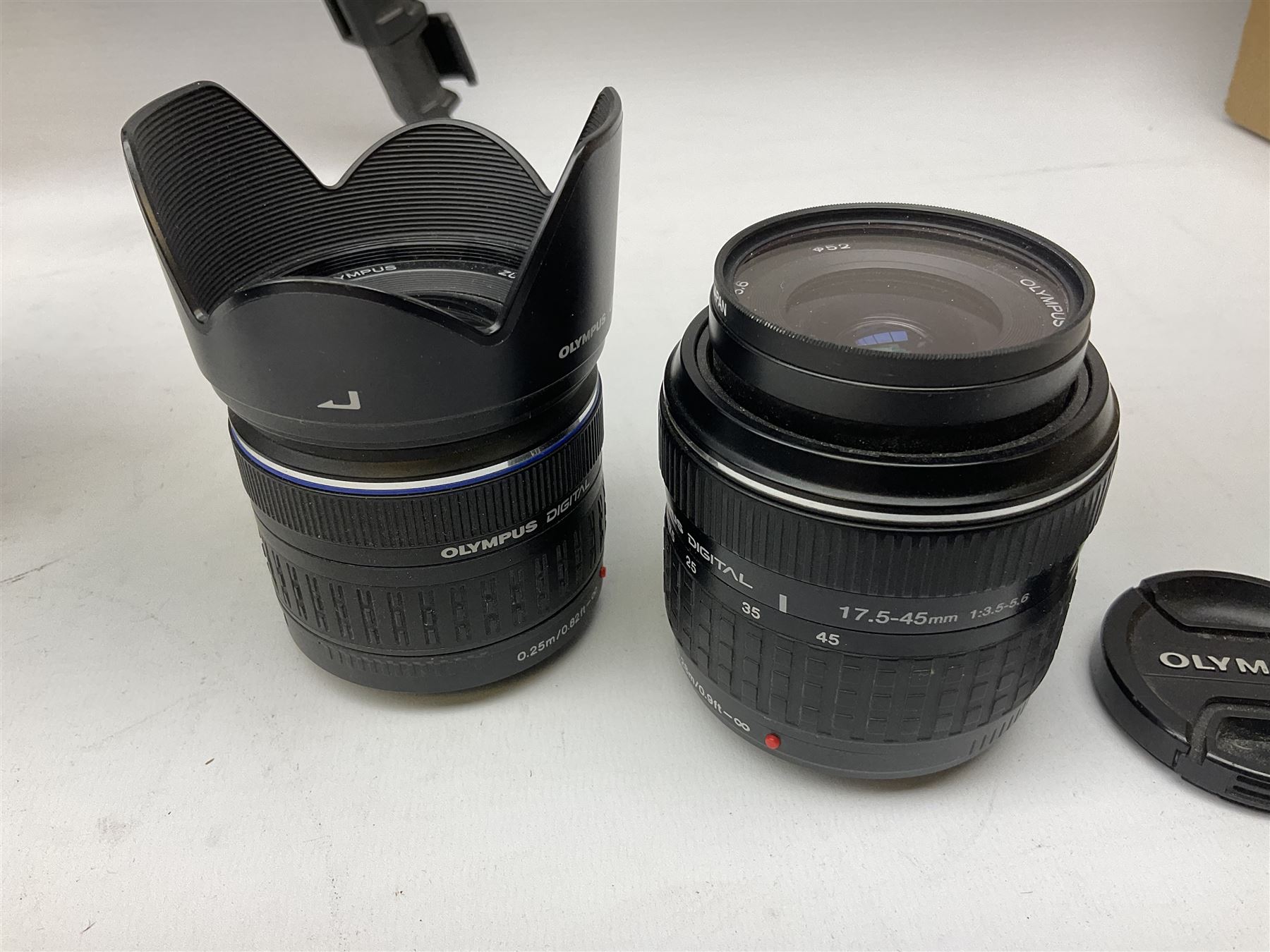 Three Olympus Camera bodies, comprising of OM-D E-M5, E-400 and E-450,   together with 'Samyang Mirror Lens 800mm 1:8.0DX', Olympus 'Zuiko Digital 40-150mm 1;3.5-4.5mm' lens, three other lenses and Velbon CX444 tripod 