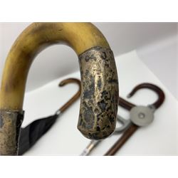 Early 20th century curved horn handle walking stick with hallmarked silver mounts, engraved L Russell 1918, together with a shooting stick by William Mills Birmingham, with leather handle, 'The Featherwaite' shooting stick and an umbrella with wooden handle