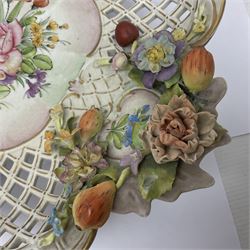 19th Meissen style centrepiece, with pierced lattice work sides and decorated in relief with fruit and floral sprigs, upon four scrolled feet, with spurious mark beneath H9cm D31cm