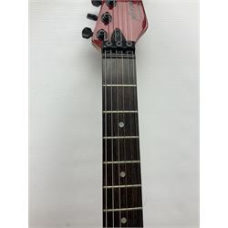 American Peavey Nitro 1 hand-made electric guitar in red with Kahler tremolo, serial no.02786479, L98cm overall; in soft carrying case.