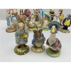 Sixteen Royal Albert Beatrix Potter figures, including Poorly Peter Rabbit, Jemima Puddle Duck and Squirrel Nutkin etc, all boxed together with a Beswick Beatrix Potter Jeremy Fisher miniature jug and four Beswick Wind in the Willows figures 
