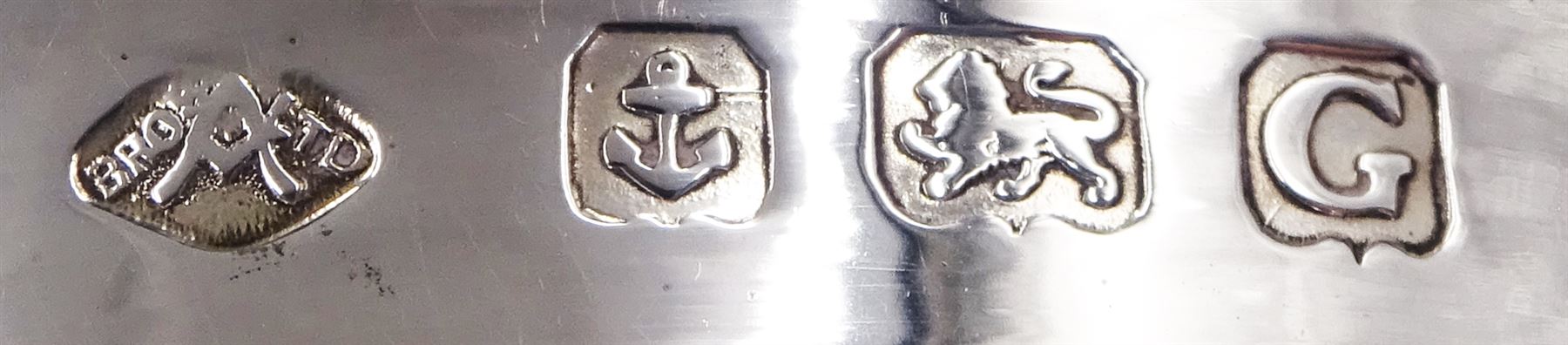 1930s silver open sucrier, of circular form with girdle, with shaped rim and upon three pad feet, hallmarked Birmingham 1931, together with silver fork and spoon set, decorated in relief with foliate pattern to handles, hallmarked William Devenport, Birmingham 1896 to blades and Sheffield 1896 handles