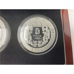 China 2008 Beijing Olympic Games official commemorative silver four coin set, cased with certificates