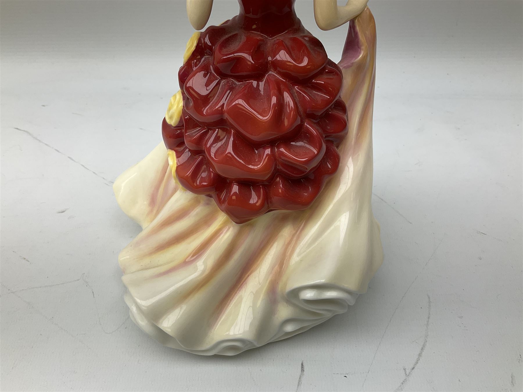 Five Royal Doulton figures from the Pretty Ladies collection, comprising Spring Ball HN5467, Autumn Ball 5465, Summer Ball HN5464, Summer HN5322 and Spring HN5321