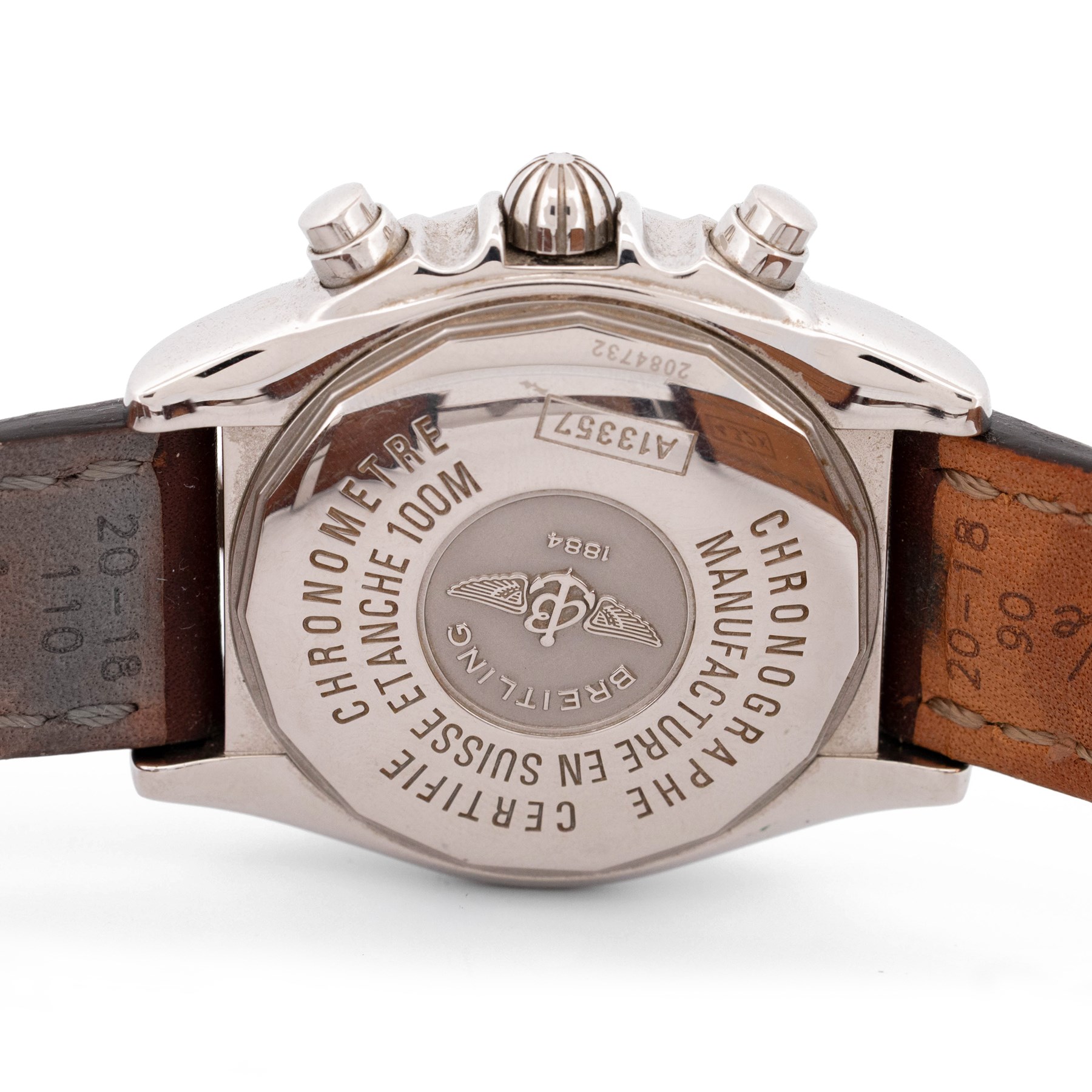 Breitling Chrono Cockpit gentleman's stainless steel diamond set automatic wristwatch, Ref. A13357, serial No. 2084732, cream dial with Roman numeral hour markers and date aperture, diamond set unidirectional rotating bezel, on Breitling brown leather strap, with fold-over clasp