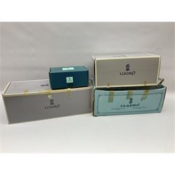 Three Lladro figures, comprising, Dreams of Summer Past no 6401, Spring Breeze no 4936 and Breezy Afternoon 5682 together with Lladro plaque Art Brings us Together no 7677, all in original boxes, largest example H35cm