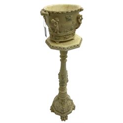 Baroque design ivory finish jardinière with stand, decorated with raised floral sprays and putto, on octagonal bulbous base with paw feet