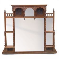 Edwardian walnut overmantel mirror, moulded cornice over three arched apertures with turne...