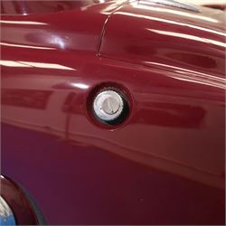 1953 Hillman Minx Saloon

Registration: NYP 135
Engine: 1,265cc petrol
Transmission: Manual, column change
Odometer reading: 37,553 miles
Colour: Maroon red
Interior: Cream
Former keepers: 3
V5C: Present
Keys: One

A 1953 Hillman Minx four-door saloon, finished in maroon red with a contrasting cream interior.

Powered by a 1,265cc petrol engine with manual column-change transmission. The Smiths speedometer displays 37,553 miles, although this mileage has not been independently verified.

The vehicle has previously been restored and presents with glossy maroon paintwork, cream bench seating and a period dashboard and steering wheel. The engine bay is painted to match the exterior and appears generally tidy. The underside has been coated or undersealed in places, with the chassis, floor sections, suspension and exhaust visible in the accompanying photographs.

At the time of cataloguing, the engine turned over but did not start.

Features

• 1,265cc petrol engine
• Manual column-change transmission
• Right-hand drive
• Four-door saloon body
• Maroon red exterior
• Cream bench-seat interior
• Smiths instrumentation
• Period dashboard controls
• Steel wheels with chrome hubcaps
• Chrome bumpers and exterior trim
• Rear-hinged bonnet
• Leaf-spring suspension

History and Documentation

• V5C registration document present
• Three former keepers recorded
• One key
• Pitman’s handbook included

Condition

The vehicle is presented in restored condition. The maroon paintwork retains a good overall gloss, with some age-related marks and imperfections visible on closer inspection.

The cream interior presents well overall, with signs of age and use to the upholstery, carpets, dashboard and controls. Some surface deterioration and pitting are visible to areas of the chrome and brightwork.

The engine bay appears tidy, although some wiring and ancillary components appear non-original or subsequently renewed. The underside has received protective coating or underseal in areas. Prospective purchasers should inspect the structure, chassis, floor, suspension and mechanical components carefully.

At the time of cataloguing, the engine turned over but did not start. The vehicle has not been mechanically inspected or road tested by the auctioneers.

Prospective purchasers should satisfy themselves as to the vehicle’s condition, specification, originality, mileage, identity and roadworthiness before bidding.

This vehicle forms part of the Estate of the Late John Sills and is offered for sale by the Executors, confirming a genuine reason for sale.