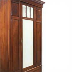 Edwardian walnut wardrobe, featuring single sectional mirror door with bevelled panes, single drawer to base