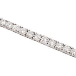 White gold round brilliant cut diamond line bracelet, stamped 18K, total diamond weight approx 7.00 carat