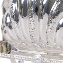Silver-plated Victorian style biscuit box, in a shell form with engraved leaf detailing, upon scroll feet, H24cm