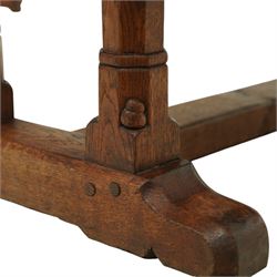 Mouseman - 1937 refectory table, Sir Herbert Baker commission for Westminster Church House, the rectangular adzed plank top above twin octagonal baluster supports united by a pegged stretcher, raised on shaped sled bases carved with a partridge and a loaf of bread, with carved mouse signature to inside leg, by Robert Thompson of Kilburn

The carved loaves reference the original patron, while the partridges are thought to represent Frank Partridge, Bishop of Portsmouth from 1877 to 1941, who played a key role in the founding of Church House and served as its Secretary from 1936 until 1941

Reference
Christie’s ROBERT “MOUSEMAN” THOMPSON; Refectory Table, Lot 188, sold at Christie’s London, commissioned by Sir Herbert Baker KCIE, RA, architect of Church House (opened 1937). Provenance and description available on the Christie’s website
https://www.christies.com/en/lot/lot-4618786