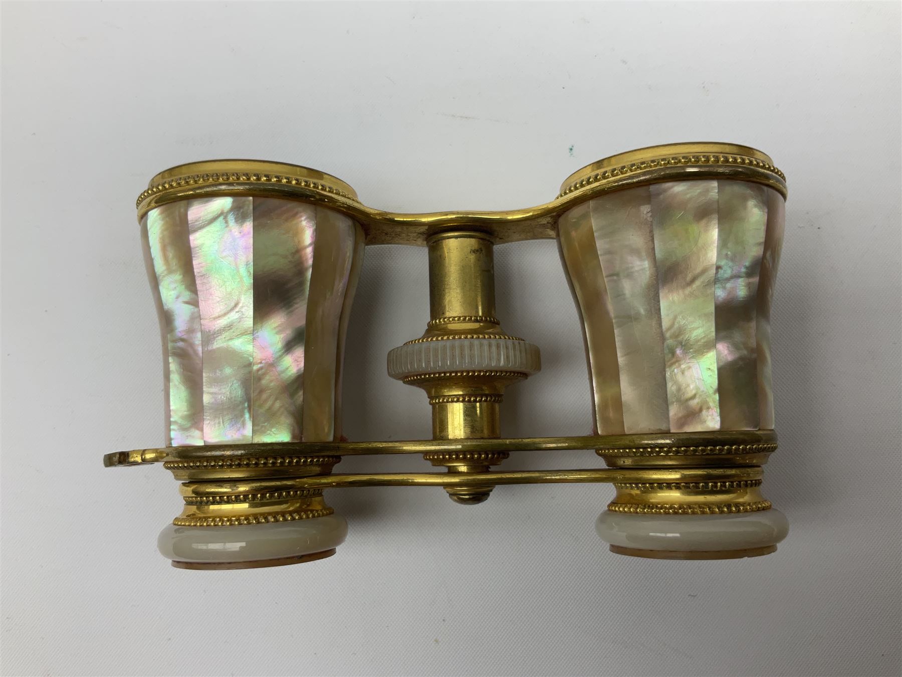 Pair of Victorian mother of pearl and gilt brass opera glasses, with
