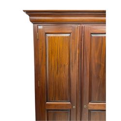 Barker & Stonehouse - 'Grosvenor' mahogany double wardrobe, projecting cornice over two panelled doors and panelled sides, on bracket feet