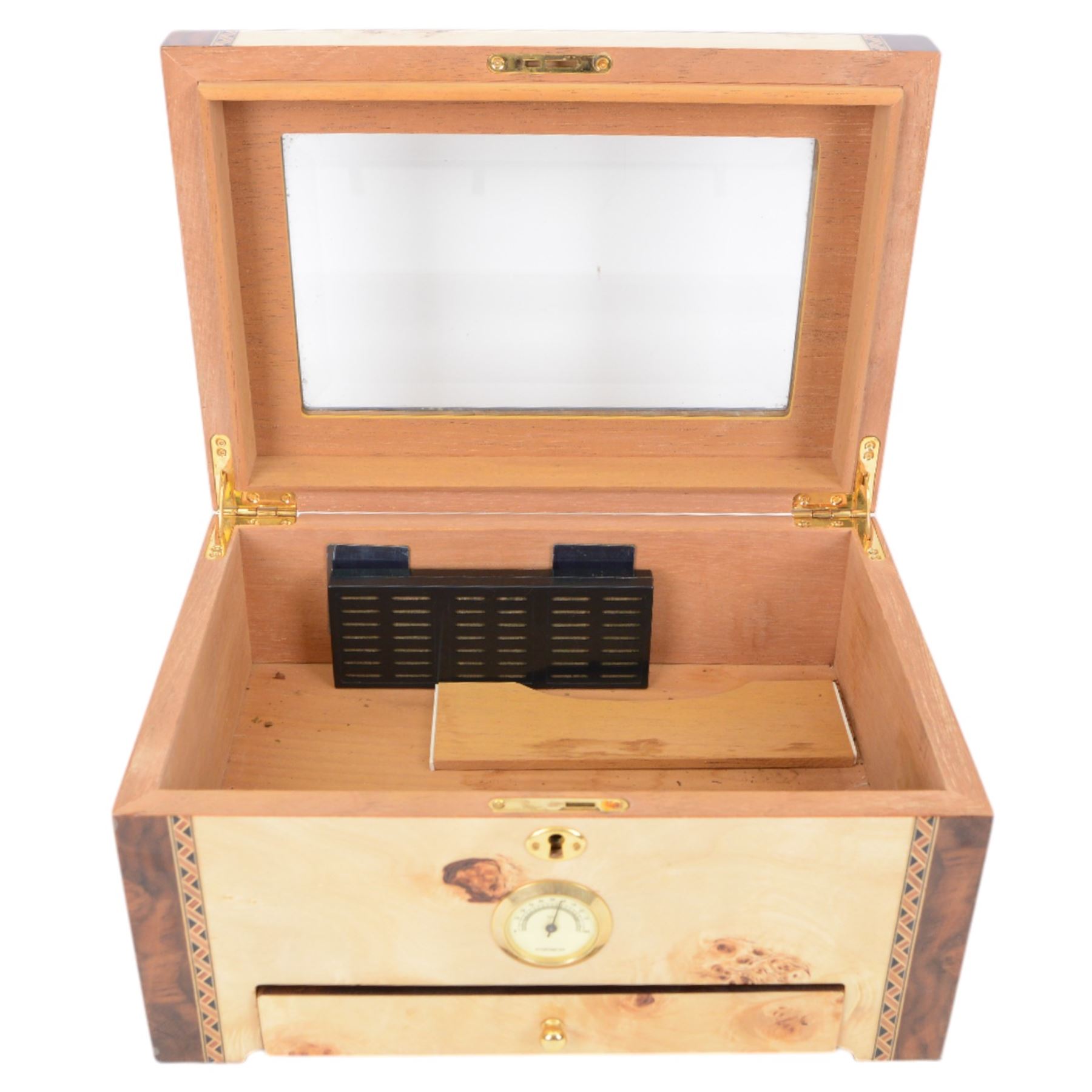 Cigar humidor, of high gloss birdseye maple veneer, the lid with central glass panel, brass handled draw to the front, fitted with a hygrometer, H18cm D24cm 