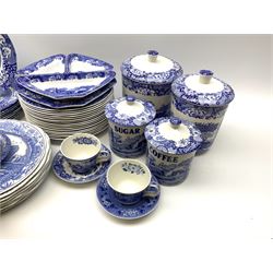 A collection of Spode blue and white ceramics, to include nine Italian pattern plates, and pair of sectional dishes comprising three canted dishes with stand, three tea cups and saucers, four storage jars of various sizes plus twenty four Spode Blue Room dishes decorated with various patterns. 