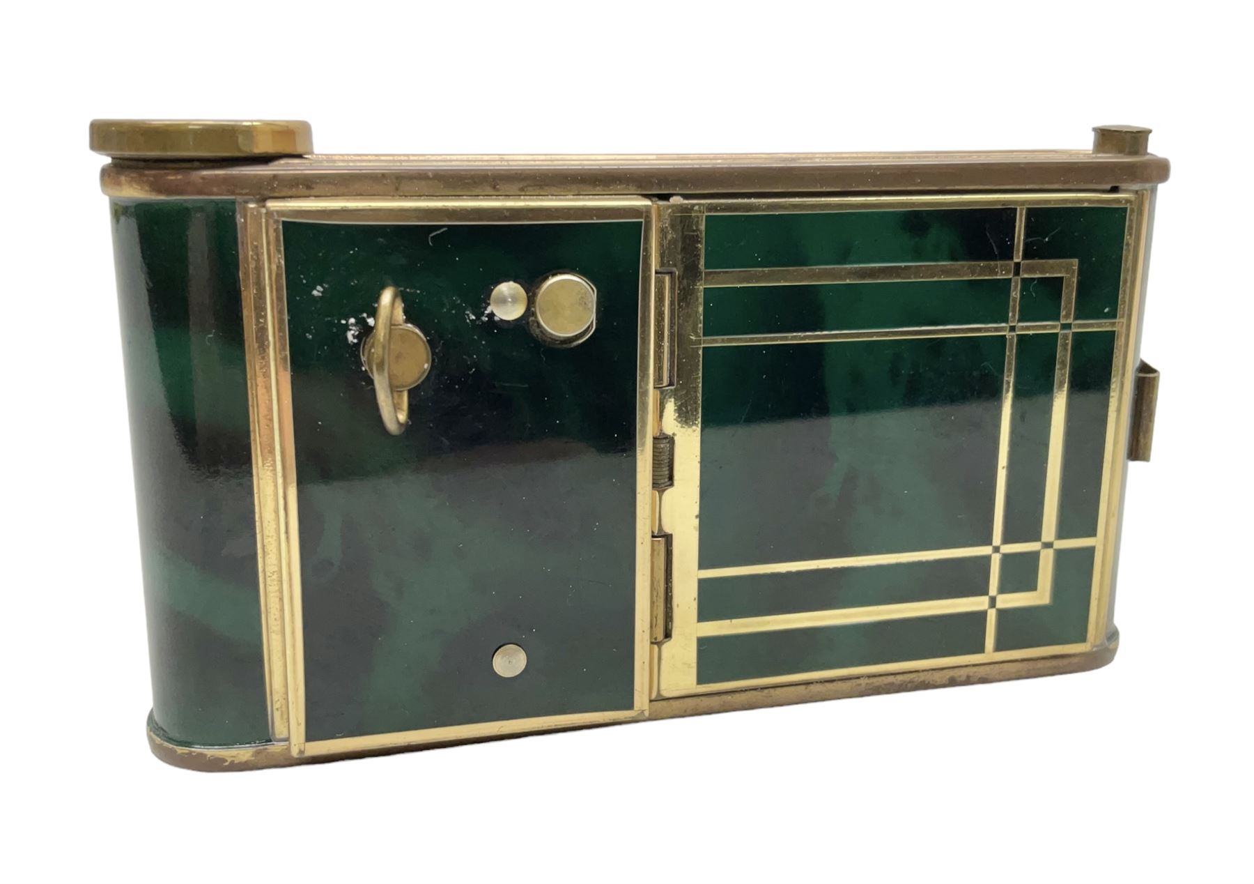 Art Deco camera shaped lady's musical compact and cigarette case, probably German, with green marble effect panels and gilt highlights, with large hinged opening to reveal engine turned brass interior with cigarette or lipstick holders, and the other side with musical mechanism and flip action powder compartment with mirror, L10cm