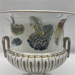 Dresden style campagna urn, decorated with feathers on a white ground with gilt handles, with crossed sword mark beneath, H20cm 