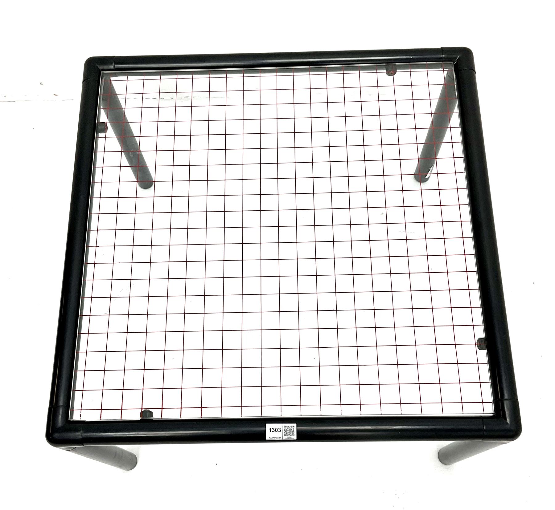 Habitat - tubular steel coffee table, inset glass top with red line grid