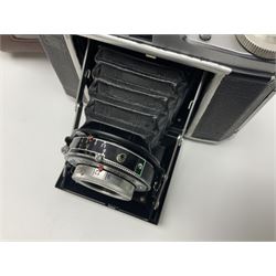 Canon EOS 50e camera body, serial no 8305671 with 'Canon Zoom EF 35-135mm 1:4-5.6' lens together with Halina 35X super camera body, with 'Halina Anastigmat f.c. 1:3.5 f=45mm' lens and other camera equipment 